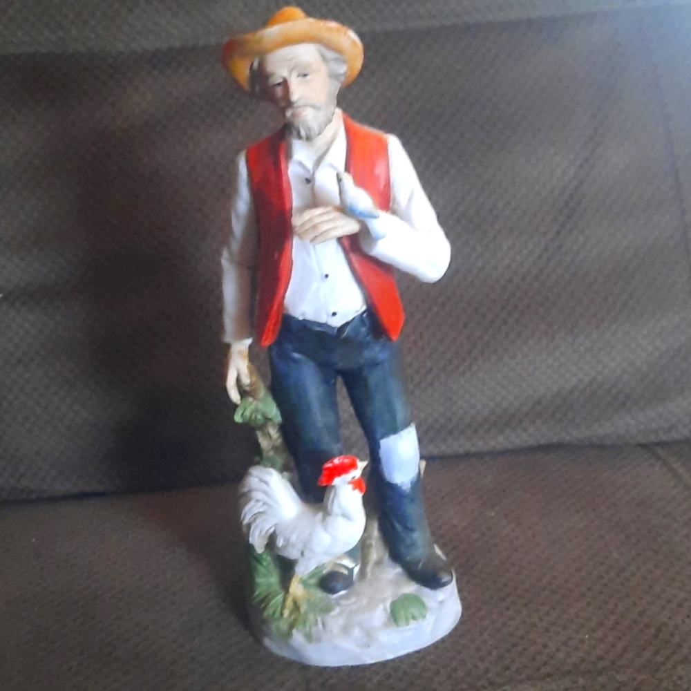 Old man with rooster